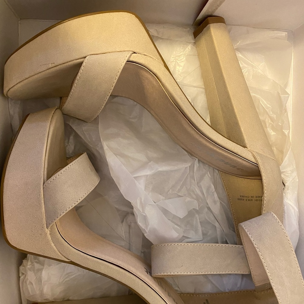 High heel white shoes